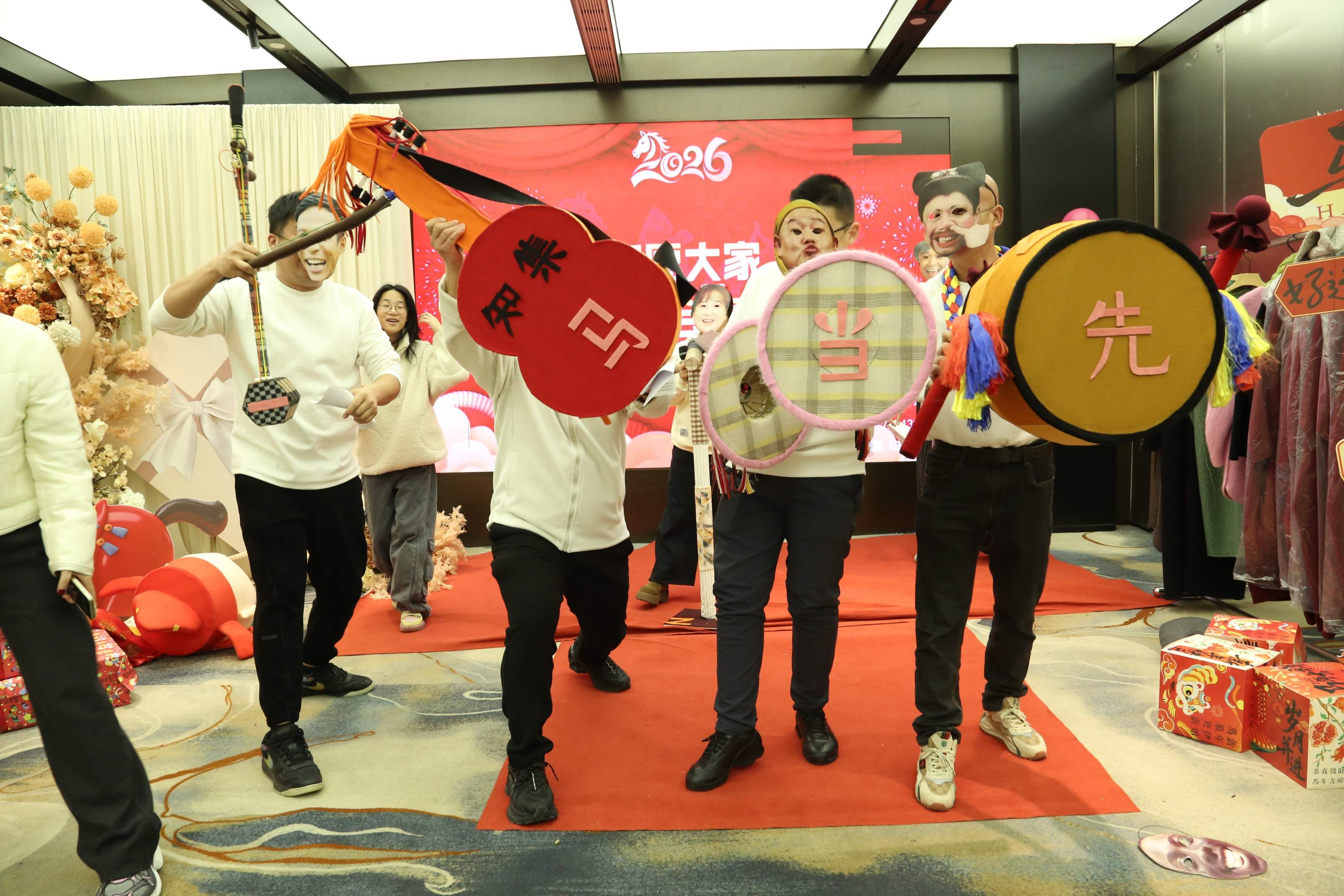 Team members performing a fun show